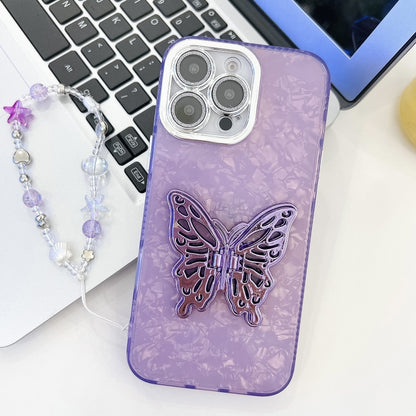 For iPhone 16 Pro Plating Glitter Lens Film Texture Butterfly Holder Wristband Phone Case(Purple Shell Pattern) - iPhone 16 Pro Cases by buy2fix | Online Shopping UK | buy2fix